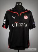 Diogo black and red Olympiakos No.10 home jersey v Arsenal in the UEFA Champions League at