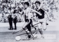 Diego Maradona signed photograph, circa 1979, original 14 by 8in. photograph showing Maradona