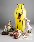 A large and bold yellow glass vase showing an oval cartouche, containing a hand-painted red and