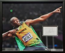 Usain Bolt - fastest man on the planet - signed photo and autograph display, featuring Bolt in his