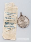 1930 FIFA World Cup silver plated participants medal, of circular form, obverse struck with a