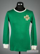 Green Northern Ireland No.6 jersey early 1970s, by Umbro, long-sleeved, white collar, cuffs and