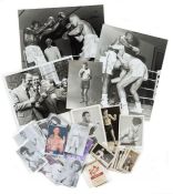 Collection of boxing memorabilia, including original press photographs, numerous postcard-size