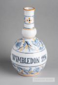 A GIROBANK limited edition water or condiment Wimbledon 1996 jug, the jug is hand-decorated in