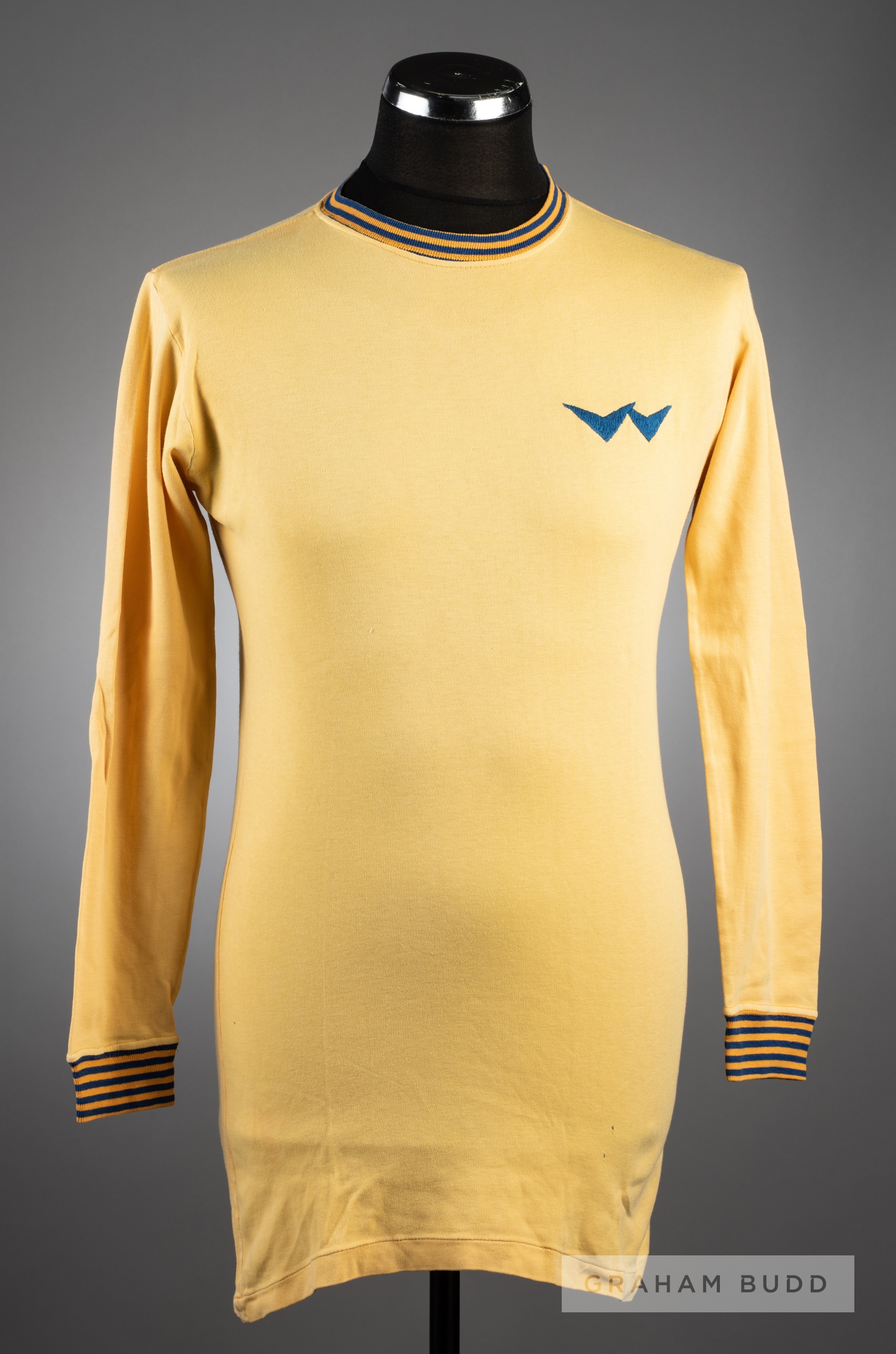Yellow Torquay United No.12 substitute's jersey circa 1969,  by Umbro, long-sleeved, gold and blue