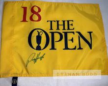 Padraig Harrington (IRE) signed "The Open" golf flag and yellow "The Open" cap, both items belonging