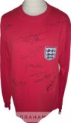 England 1966 World Cup Final retro shirt signed by nine of the winning players, comprising Alan