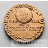 A rare FIFA 1934 World Cup official participation medal awarded to Dr Mario Tortarolo, obverse