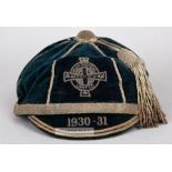 Northern Ireland International cap awarded in 1930-31, the navy velvet cap with gilt tassel and