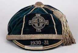 Northern Ireland International cap awarded in 1930-31, the navy velvet cap with gilt tassel and