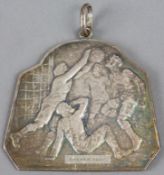 C.A. Spora Luxembourg 20th anniversary 1907-27 silvered medal, obverse with four footballers in