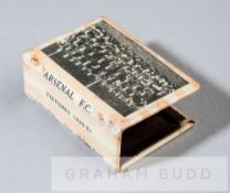 Arsenal FC 1920-21 fixtures matchbox holder, the metal matchbox holder bearing a b & w team
