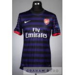Mikel Arteta purple and black hoop Arsenal no.8 away jersey in the UEFA Champions League, season
