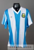 Blue and white striped Argentina No.23 home jersey, circa 1990, short-sleeved with country crest and