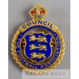 A pair Football Association Council member's badges awarded to M.C. Frowde in 1939, each gilt