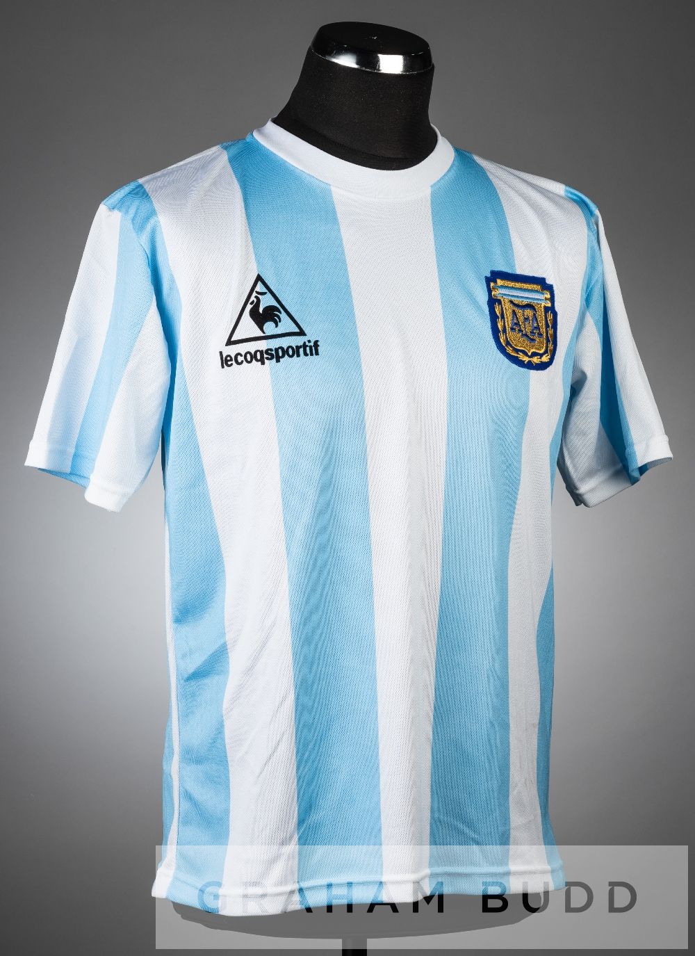 Diego Maradona signed blue and white stripped Argentina no.10 replica jersey,  short-sleeved with