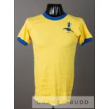 An example of an early replica jersey being an Arsenal 1971 F.A. Cup example, yellow with blue trim,