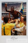 Pele signed colour photographic print celebrating winning the 1970 World Cup with team mates, signed