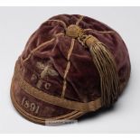 Football representative cap 1891, the dark red velvet cap with gilt braiding and tassels,