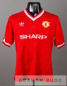 Steve Bruce signed red Manchester United no.4 home jersey, season 1987-88, by Adidas, short-