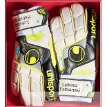 Arsenal's Lukasz Fabianski Uhlsport goalkeeper's gloves, framed, white, black and yellow gloves each