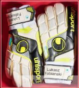 Arsenal's Lukasz Fabianski Uhlsport goalkeeper's gloves, framed, white, black and yellow gloves each