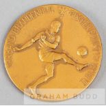 German football medal dated 13th May 1928, bronze, obverse with a footballer kicking a ball in