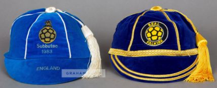 A navy Real Falkirk cap and a blue Subbuteo England International cap which featured in the comedy