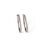 9 ct white gold diamond hoop earrings.