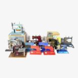 A collection of eleven vintage sewing machines