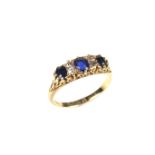 18 ct yellow gold sapphire and diamond five stone ring.