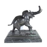 A large cast bronze elephant.