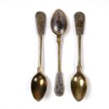 Three Russian parcel gilt silver and niello spoons, early 20th century
