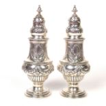 A pair of Victorian sugar casters