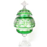 A Bohemian green flashed cut glass urn and cover, probably late 19th/early 20th century