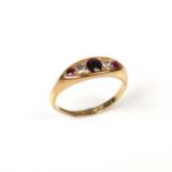 18 ct yellow gold ruby and diamond five stone ring.