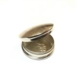 An English silver pill box, 20th century