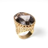 Yellow gold smoky quartz cocktail ring.