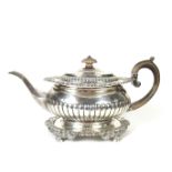 A George III silver matching teapot and stand
