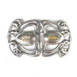An Edwardian Liberty & Co Art Nouveau silver belt buckle