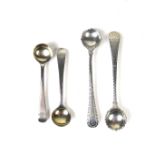 Two pairs of English silver condiment spoons