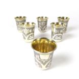 A Russian set of six silver gilt beakers