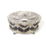 A Victorian silver mounted tortoiseshell dressing table casket