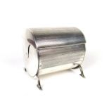 An unusual George V silver revolving tea caddy