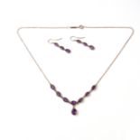 9 ct yellow gold amethyst necklace and earrings.