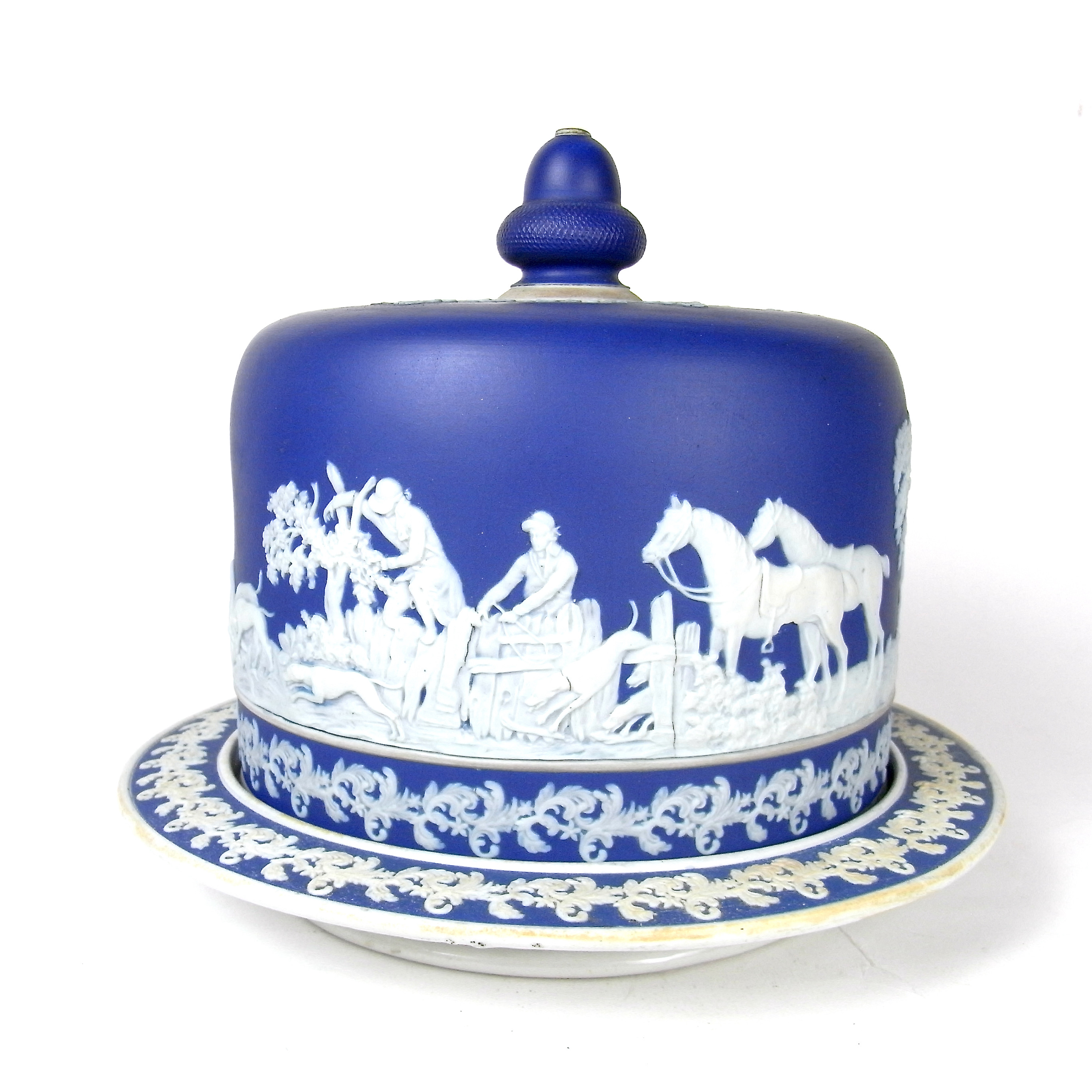 A Victorian jasperware stilton cheese blue and white cover and stand