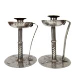 A German pair of Arts & Crafts Goberg wrought iron candlesticks by Hugo Berger, circa 1908 - 1915