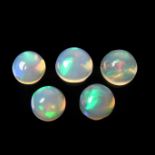 Five loose circular cut opals.