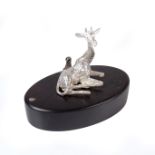 A Patrick Mavros silver giraffe place card holder