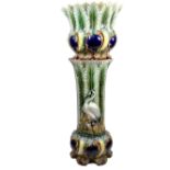 A large majolica jardiniere and stand, late 19th century